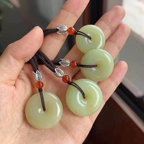 Natural jade peace buckle Hetian jade button pendant Xiuyan tremolite yellow and white old jade peace buckle pendant wholesale