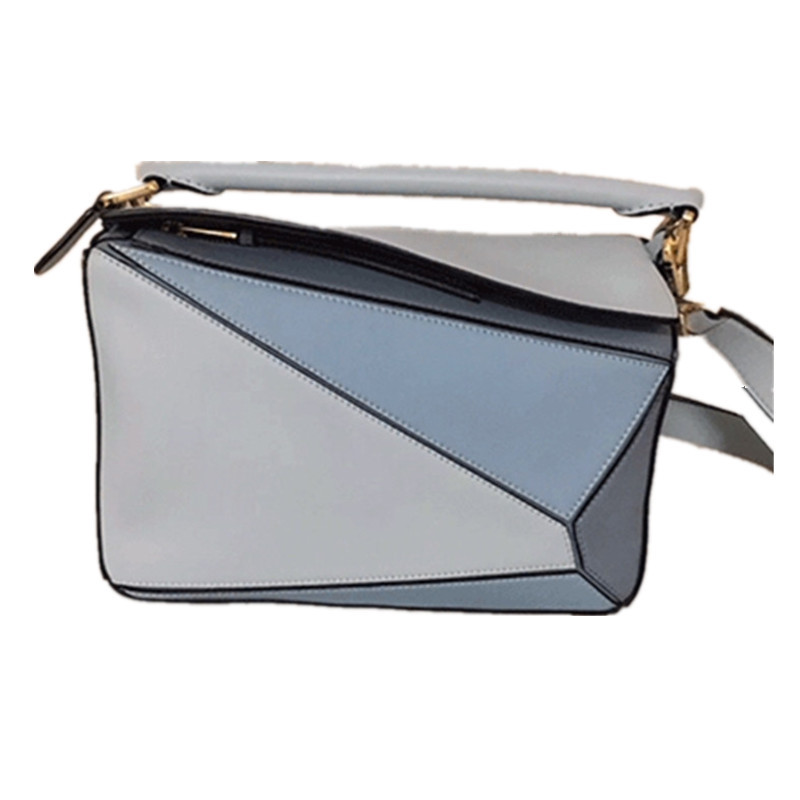 2024 nuevo paquete geométrico moda bolso cuadrado de cuero de vaca con patrón de litchi con un hombro inclinado y una capa de cabeza portátil