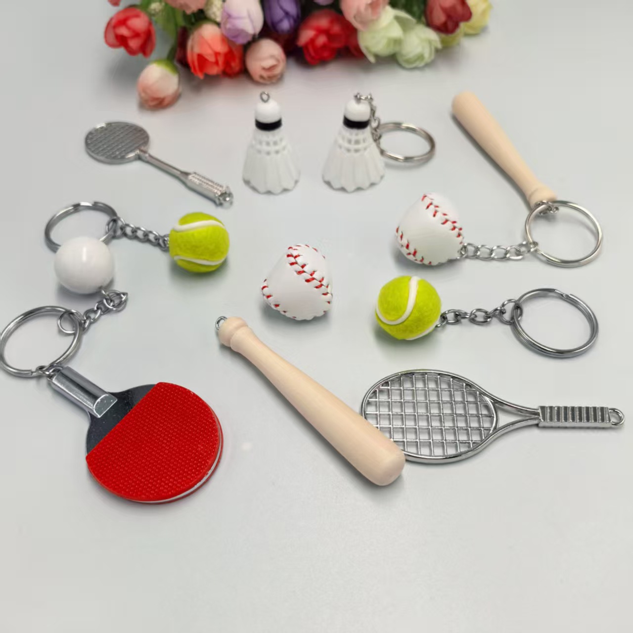Mini pequeño tamaño de simulación de bádminton llavero colgante adornos deportivos ventiladores pequeños regalos transfronterizos