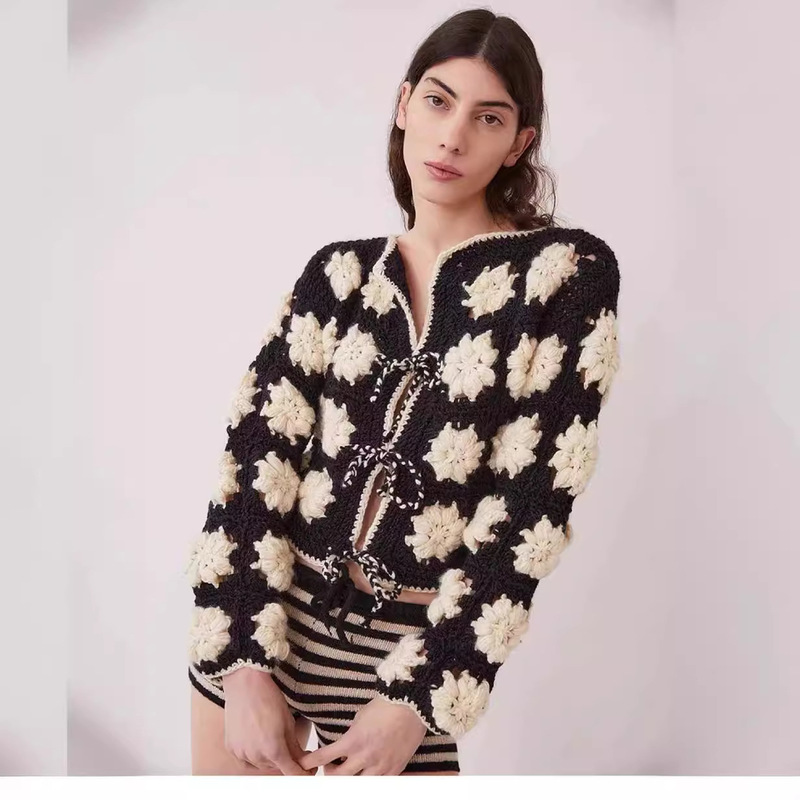 Europe and the United States new three-dimensional flowers handmade crochet hollow black and white contrast sweater cardigan sweater
