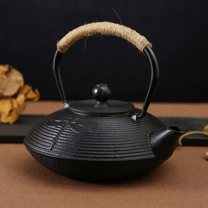 源头厂家大容量生铁茶壶无涂层铸铁扁壶蜻蜓点水创意铁壶带滤网
