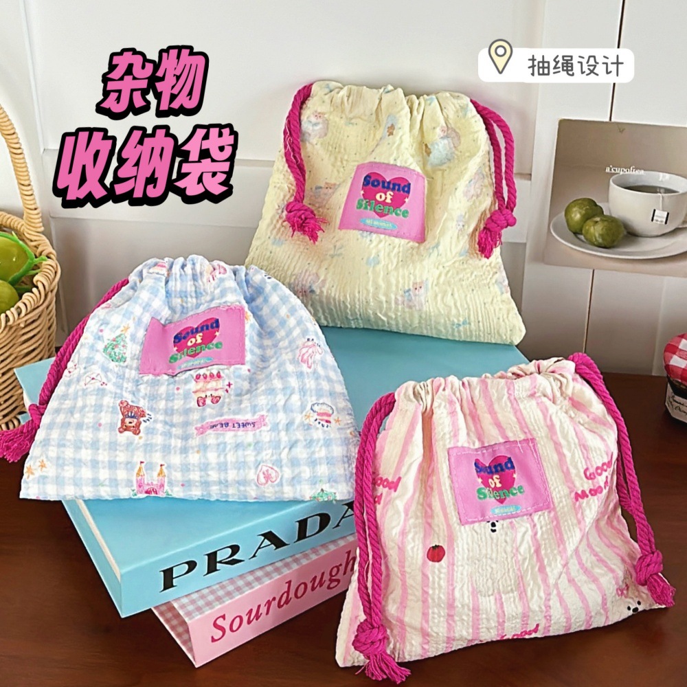 Nuevo lindo paquete de dibujos animados cuerda de dibujo bolsas de espuma portátiles de moda para salir bolsas de maquillaje pequeñas bolsas