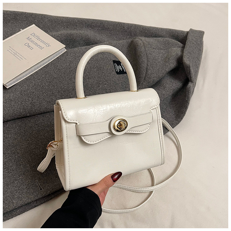 Moda 2025 primavera y verano nueva versión coreana de la retro Kelly bolso femenino 100 bolsos de hombro, nicho, bolso casual simple