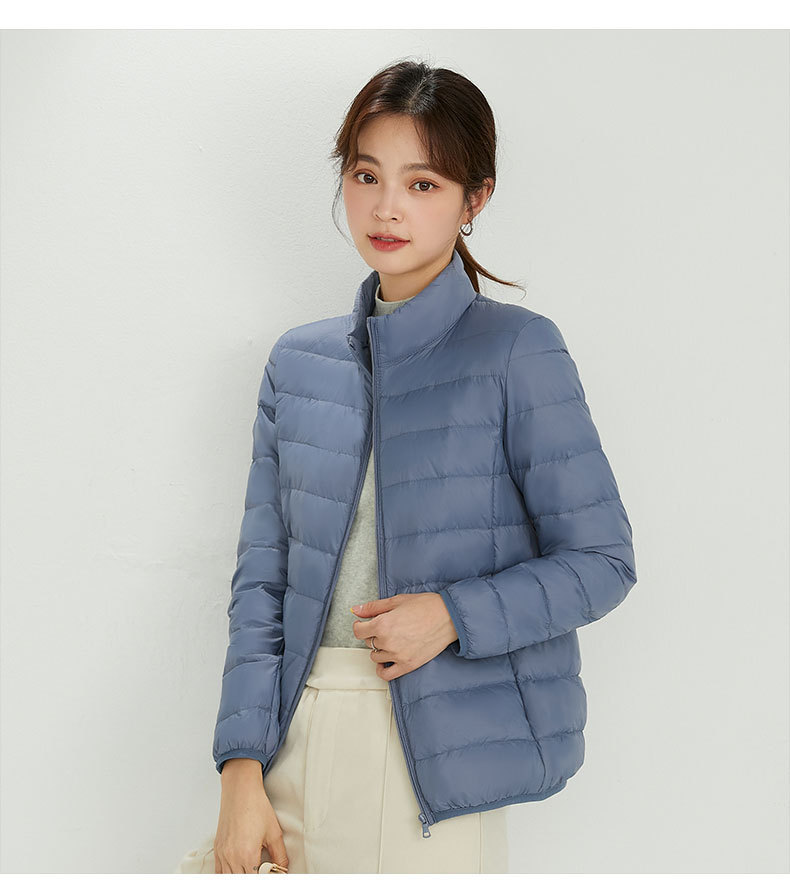 90 chaqueta de plumón de mujer con capuchón ligero corto de tamaño grande ligero estilo extranjero chaqueta de plumón blanco chaqueta Pinghu al por mayor
