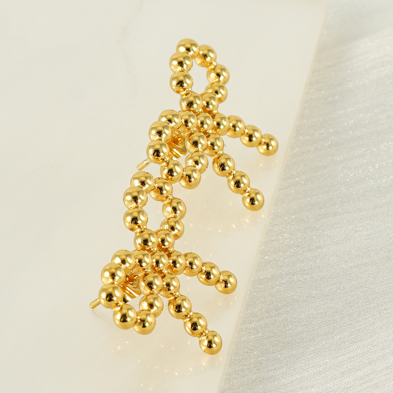 Transfronterizo europeo y americano estilo ins nueva personalidad tendencia chapado en oro de 18k cuentas redondas de acero inoxidable aretes de lazo pendientes accesorios