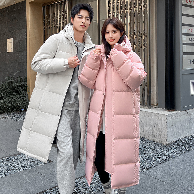 Chaqueta negra transfronteriza hombre y mujer super larga rodilla gruesa chaqueta de plumón de invierno de 2025 pareja traje