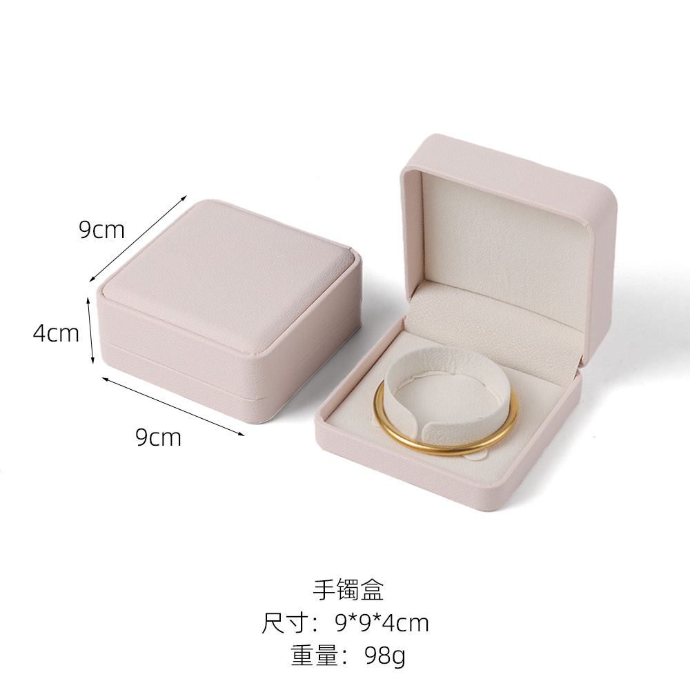 Caja de joyería rosa de alta calidad de cuero pu caja de embalaje de marca de joyería logotipo colgante pulsera collar caja de anillo