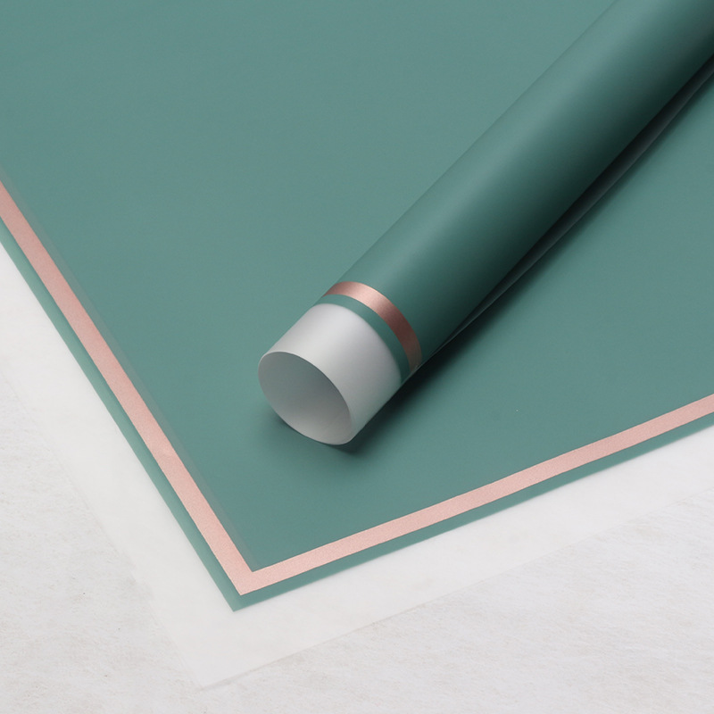 Huaxi transfronterizo Han Bundle de papel volador de película de gel de envoltura de flores impermeable florista suministros de flores papel de envoltura de ramo
