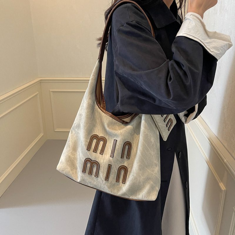 カジュアルレトロ大容量バッグ女性のための 2025 春夏新作パーソナライズされた美的ファッションショルダークロスボディバッグトートバッグ|undefined