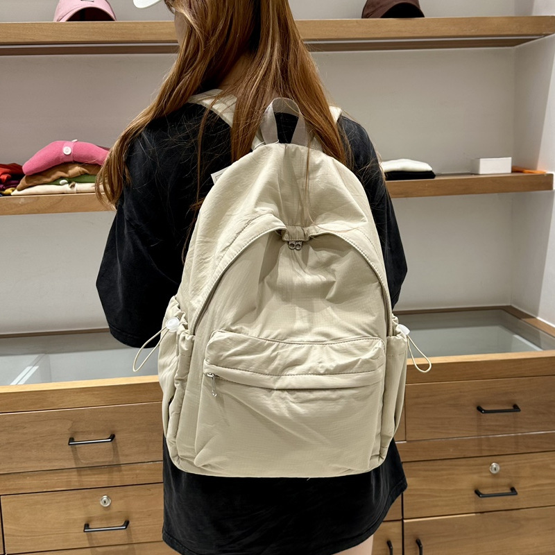休閒輕便大容量雙肩包男女通用2025新款簡約通勤旅行背包韓版書包