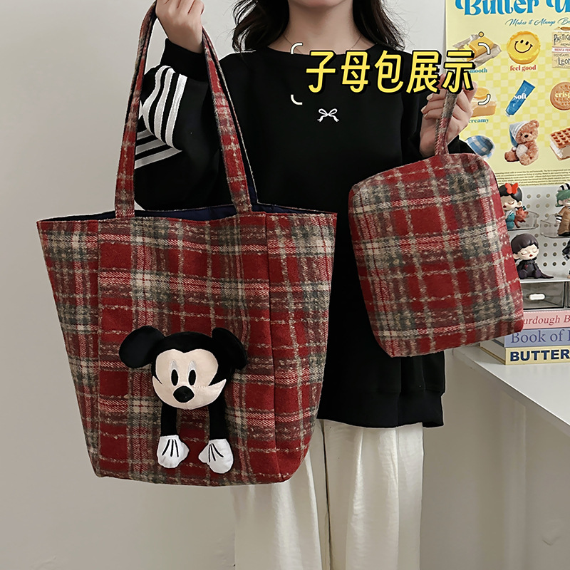 Mujer 2025 nueva tarjeta popular celosía estudiantes bolsos de primavera de gran capacidad bolsos de hombro bolsos de ocio y desplazamiento bolsos especiales