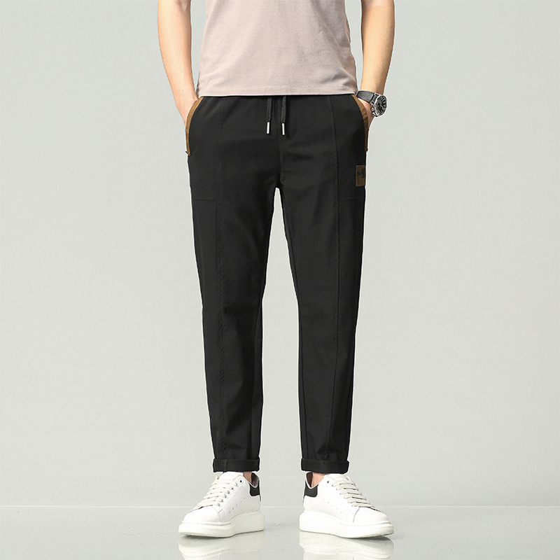 Pantalones casuales de los hombres primavera y otoño nuevo slim fit flaco chino bordado elástico cintura encaje casual jeans ropa