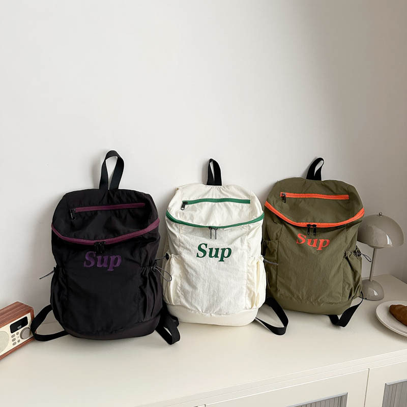 Mochila coreana para niños y niñas, mochila deportiva de viajes de gran capacidad, mochila para niños con letras de aire extranjero 2025, mochila para niños