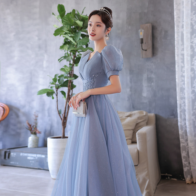 Vestido de noche azul para mujer, nuevo modelo 2026, diseño de calidad para banquetes, actuaciones vocales, exámenes, presentaciones y reuniones anuales, con cuello en V profundo.