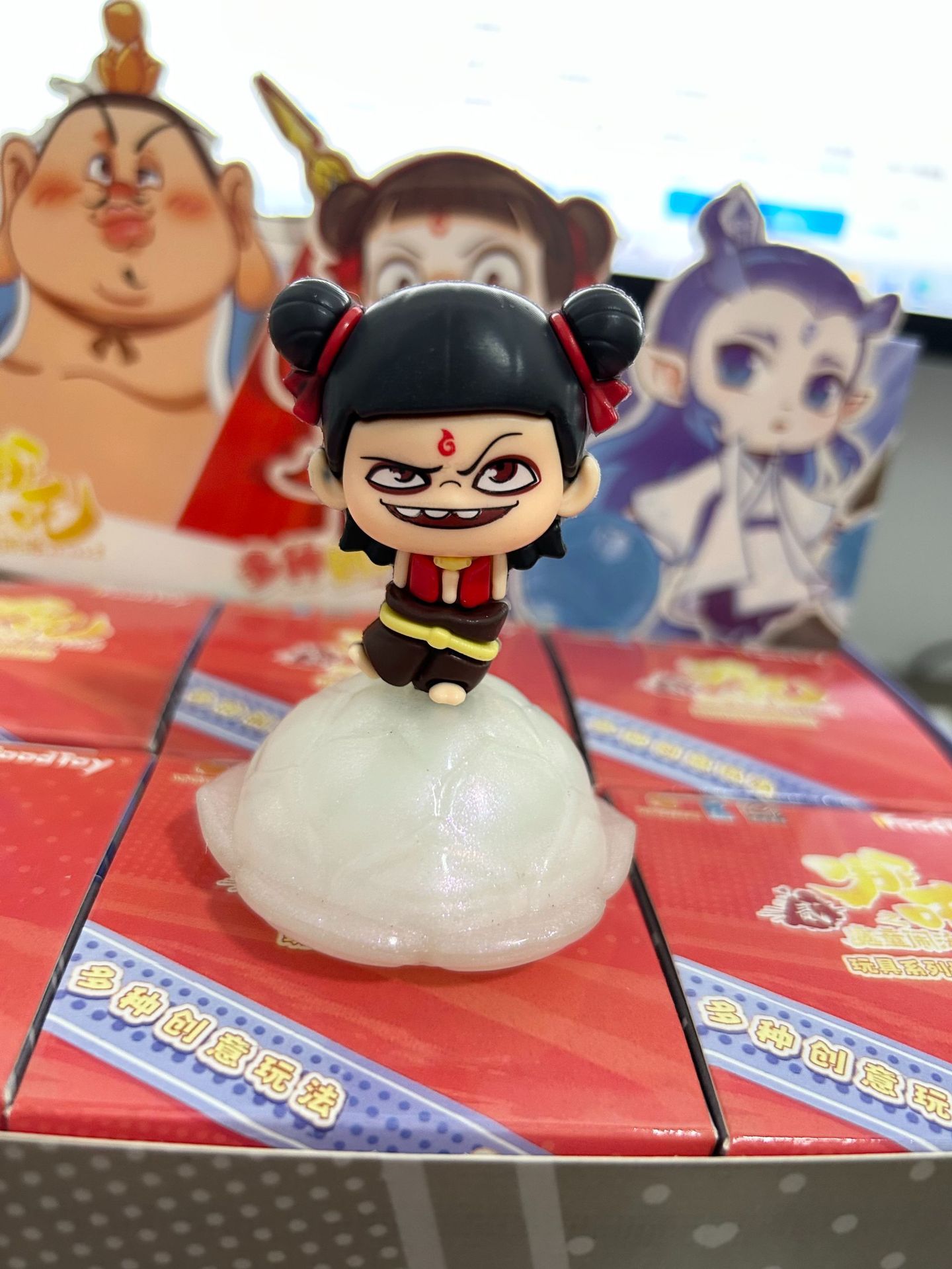 Caja ciega de Nezha Dong Dong Le Chao jugar popularidad en línea caja ciega juguetes para niños muñecas estandos de muñecas pequeñas mercancías popularidad en línea