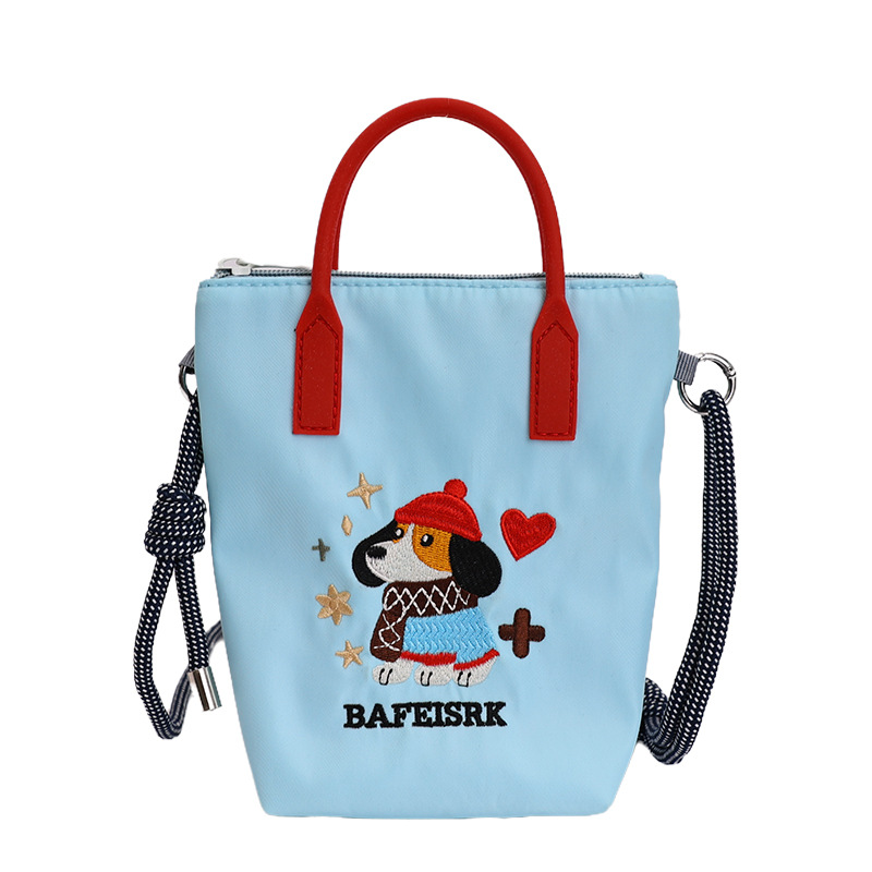 2026 nuevo estilo de alto nivel de sentido perezoso viento bordado portátil tipo cubo bolso de teléfono móvil lindo tela de nylon de color sólido mochila