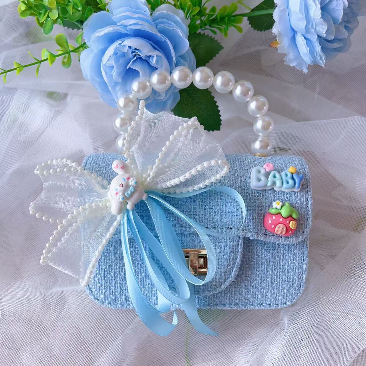 Nuevo tipo de bolsos para niños, bolsos de moda, bolsos de princesa de viento, bolsos portátiles lindos para chicas, bolsos de red para bebés.