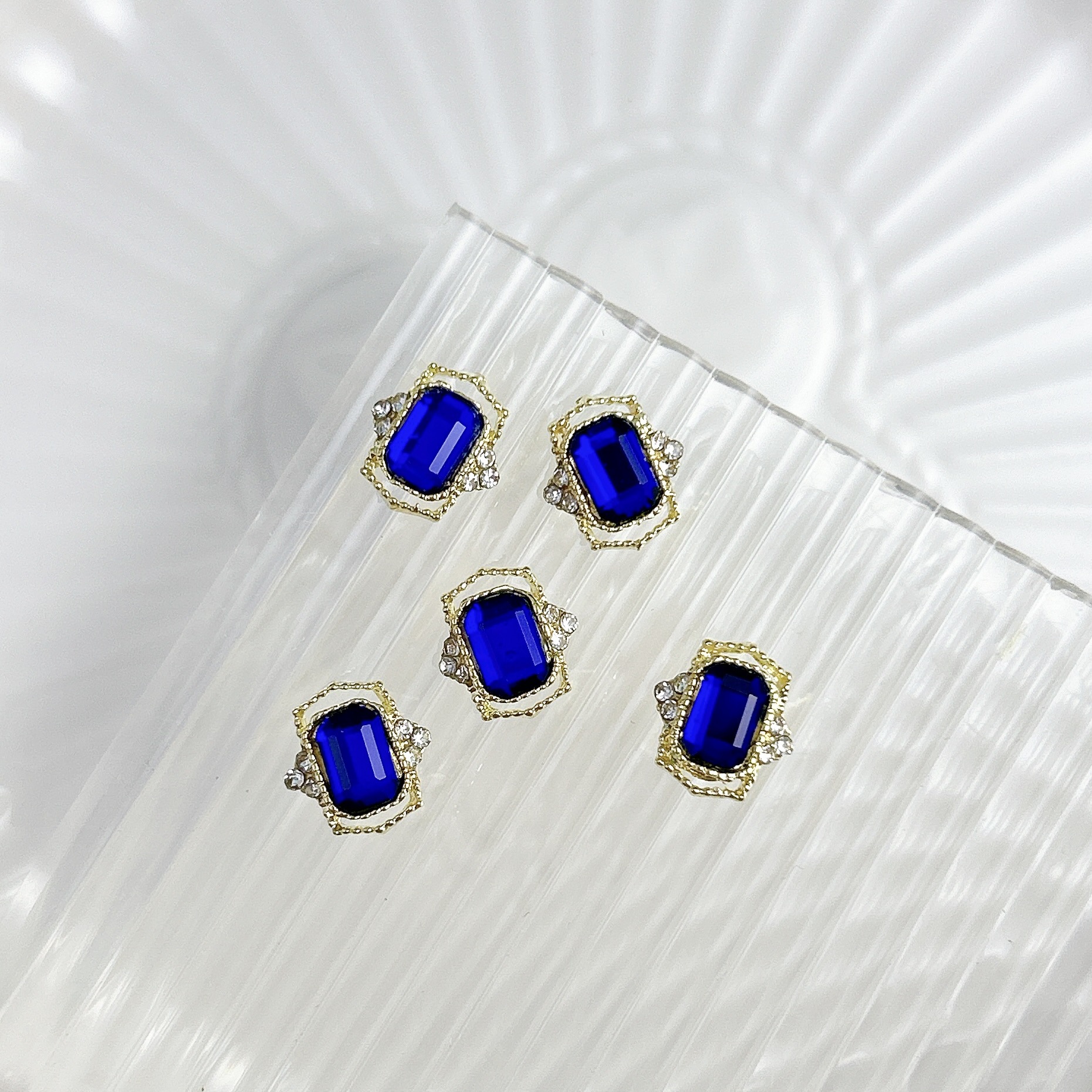 Nueva aleación china joyas de manicura taladro explosión grasa flash Fang amor gota de agua XiFeiYuan la misma armadura de la corte con taladro
