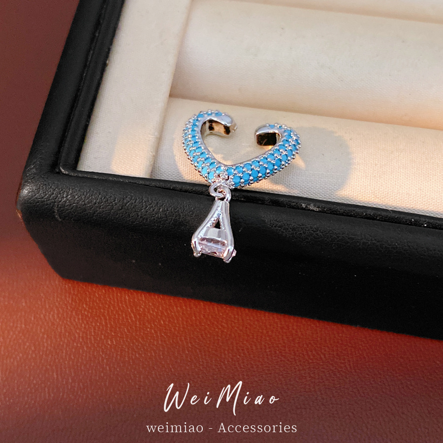 Zircon azul en forma de corazón de pentagrama estrellas de bordas de orejas para mujeres sin agujeros de orejas personales pendientes de nicho lujosos de alto nivel