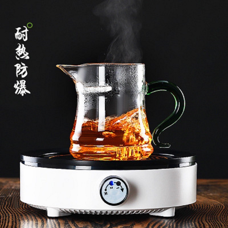 Fábrica al por mayor de vidrio grueso resistente al calor taza de feria águila boca filtro Kung Fu dispensador de Té Verde taza de la Media Luna justo