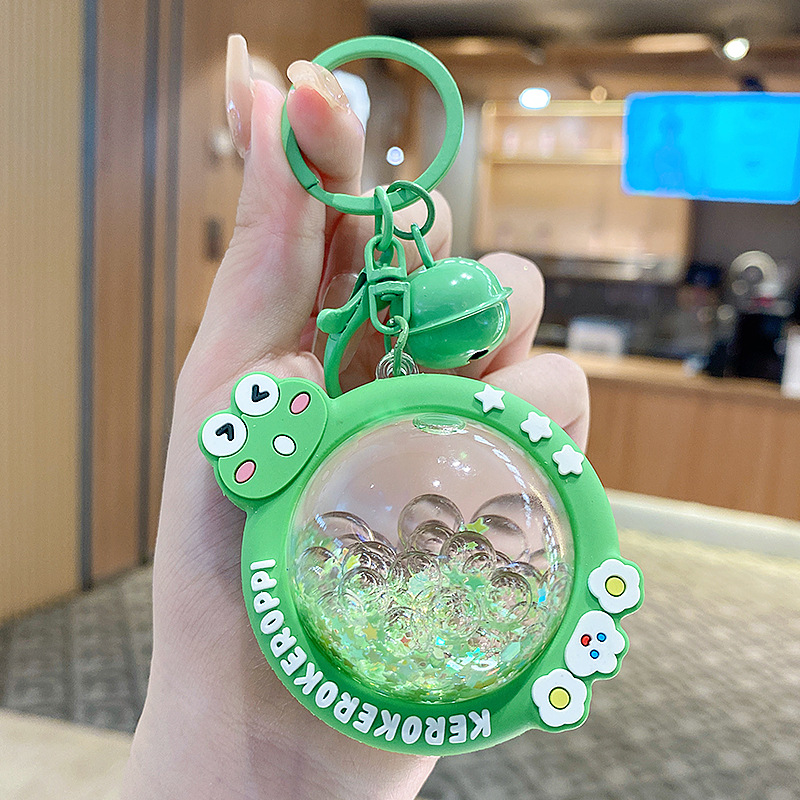 En línea de la celebridad de dibujos animados KT cristal coche llavero mujer libro bolsa colgante pequeña joyería aceite arenas movedizas estrella Delu colgante creativo