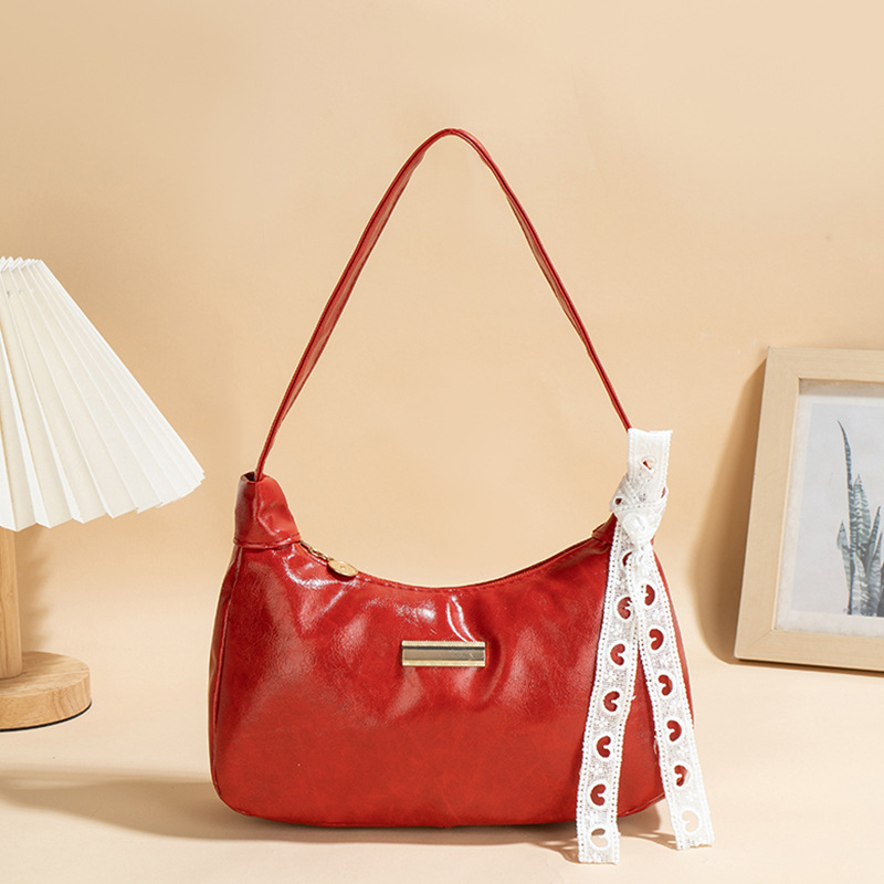 Bolso de cuero PU suave de cuero de aceite 2025 nueva moda universal bolso de moda de mujer bolso de brazo portátil pequeño