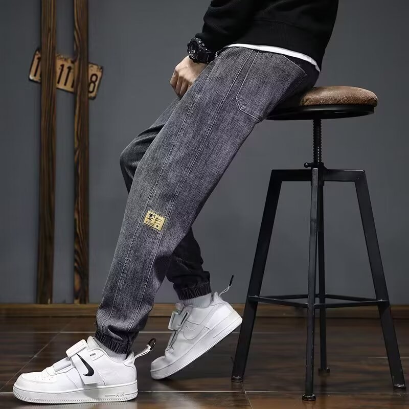 2024 primavera y otoño pantalones vaqueros de cintura elástica todo fósforo para hombres, pantalones de pierna ancha rectos sueltos para adolescentes de la calle principal