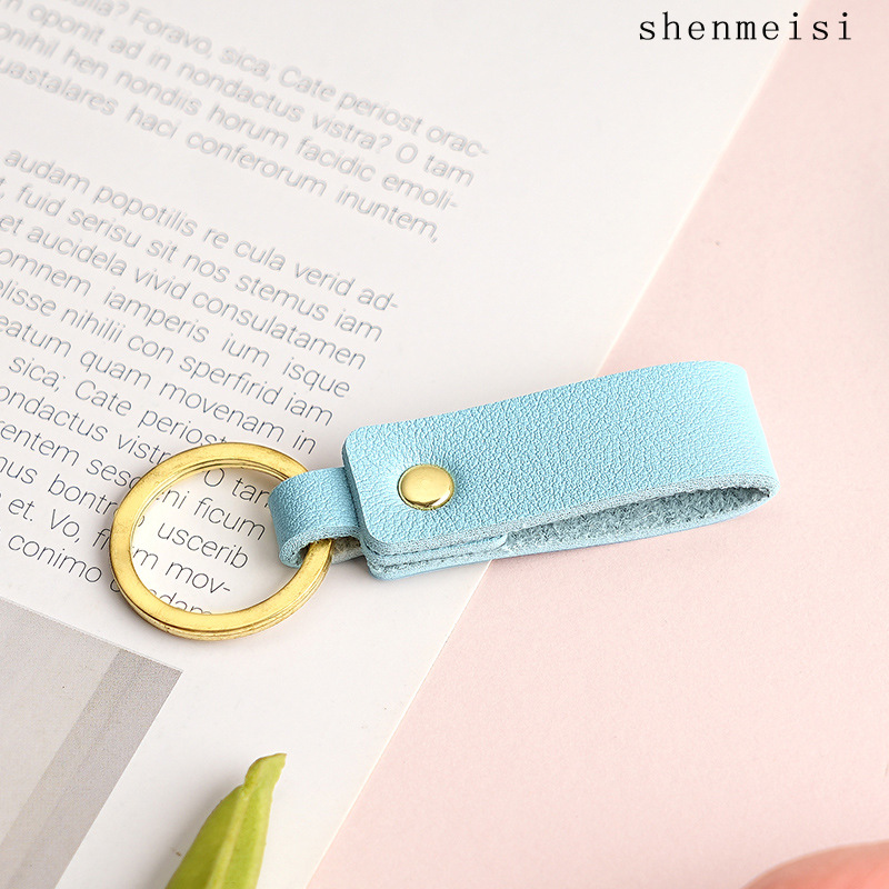 Keychain de cuero pu transfronterizo estilo simple de mano hebilla de cuero logotipo imprimible colgante de cuero llavero para hombres y mujeres