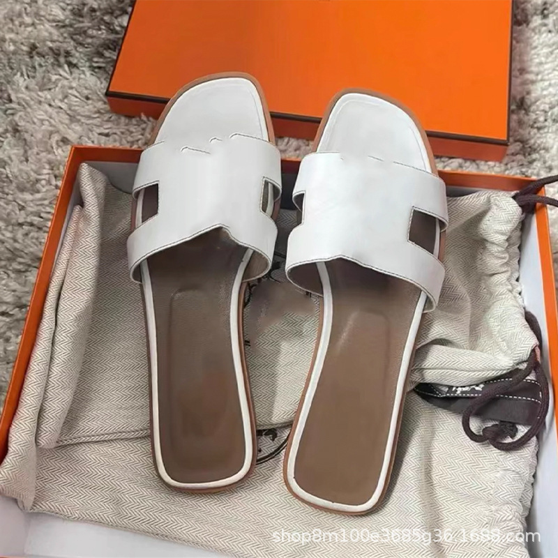 鼎羊皮の新型真皮平底ネット赤同タイプのスリッパ女性夏外着一字引きビーチカジュアル太さと涼しさ引き