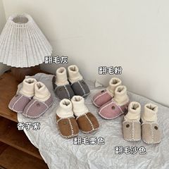 河南桑坂の新型は毛皮の一体の赤ちゃんの保温靴を厚くします。