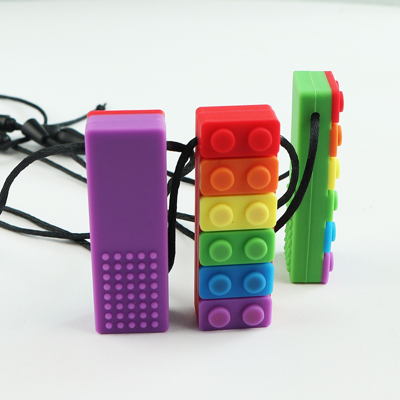 Manufacturer Direct Sales Children's Educational Building Blocks Teething Pendant Baby Chew Toy Solid Color Silicone Teething Ring Wholesale
