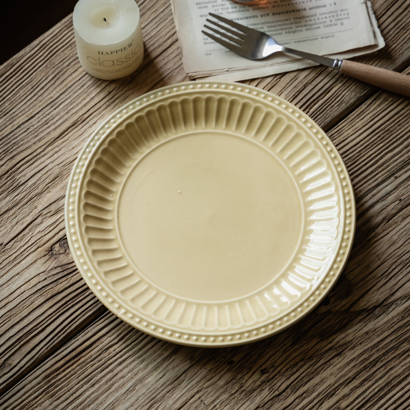 Plato redondo de cerámica refinado en relieve plato poco profundo platos de platos caseros restaurante de alto valor de postre platos de cubierta al por mayor