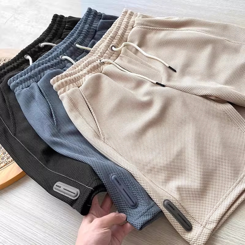 Pantaloncini casual da uomo in maglia waffle con trama a nido d'ape e stampa ananas, traspiranti e dalla vestibilità ampia, ideali per l'estate e l'attività sportiva._voghion.com