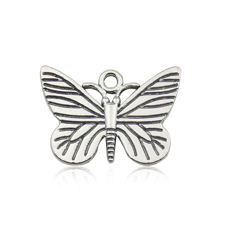 Venta transfronteriza de colgante de aleación de plata Xizanga con forma de mariposa, hecho a mano, para collar, pulsera, accesorio de joyería, venta al por mayor.