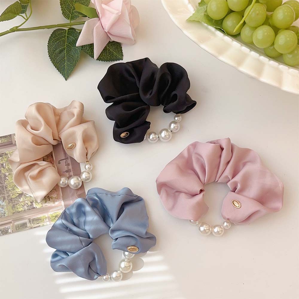 Lujo ligero de perlas de cabello de 2025 nuevo cabello de alta gama correa cubierta de cuero de mujer de alta elasticidad anillo de cabello de moda duradera