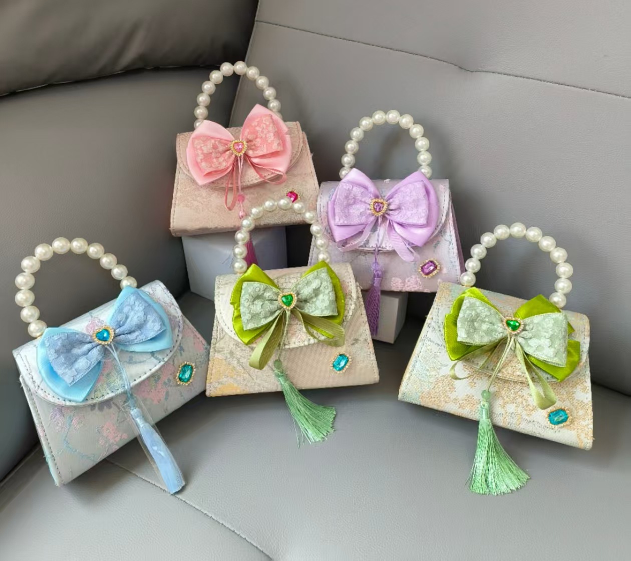 Bolsa portátil de la princesa de perlas estilo nacional arco de hombro bolso de cadena bolso pequeño bolso de cambio de Año Nuevo