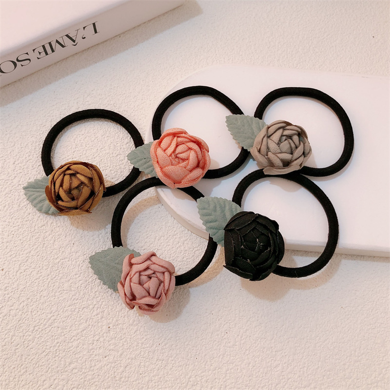 El viento francés pequeño anillo de cabello de rosa para mujeres de alto nivel de ardor de flores de borde de cabeza de correa de cabello para chicas