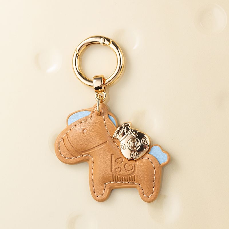 すぐにお金があります。手作りの牛革車のキーホルダーは精巧でシンプルで個性的な男女カップルのキーホルダーです。