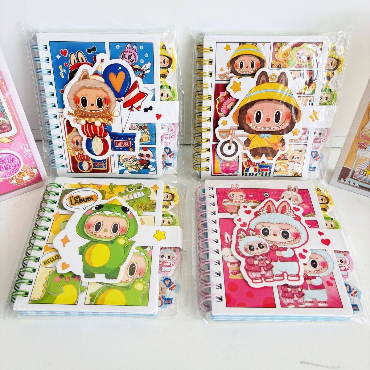 Cuaderno Espiral Clasificador A7 con Páginas Coloridas a Rayas