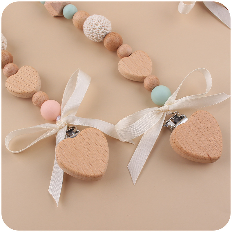 Nuevo bebé de dibujos animados hechos a mano arco chupete cadena creativa DIY bebé silicona teether pulsera juguete