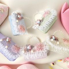 韓国の子供の斜めのショルダーバッグの新型の大きい顔の犬の真珠のハンドバッグの小さい香りの風のかわいいチェーンバッグの王女のアクセサリーのカバン