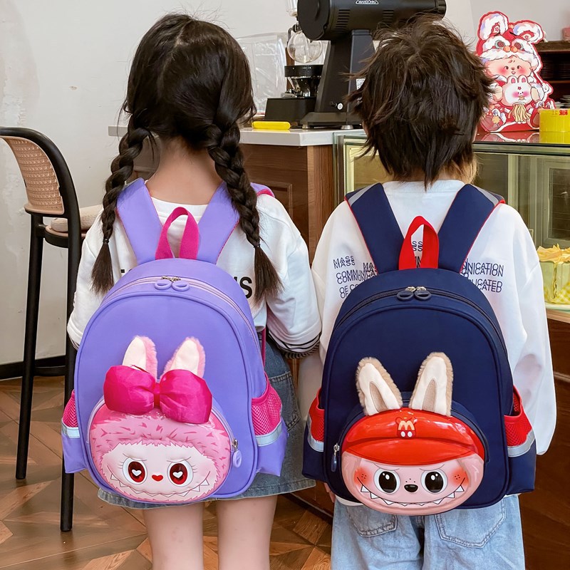 Nueva moda guardería mochila de alta calidad lienzo de dibujos animados tendencia casual lindo extraño mochila de hombro para niños