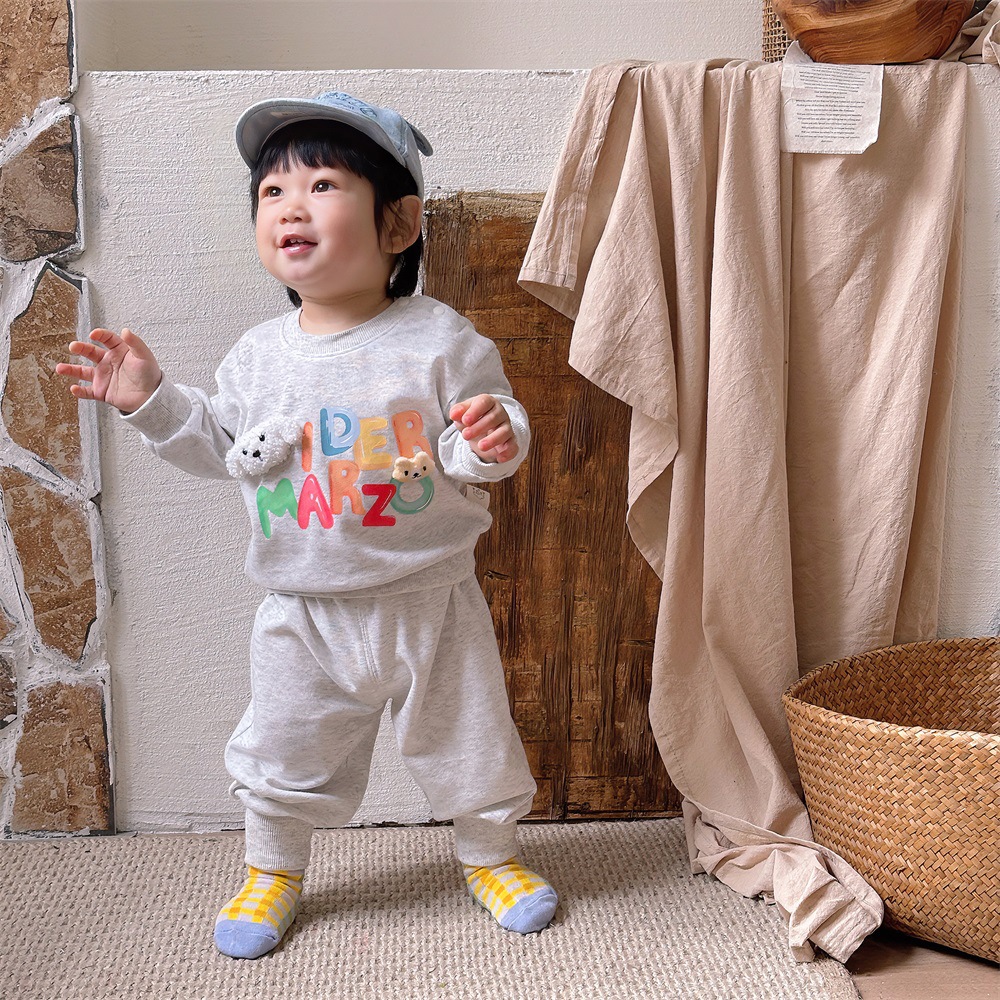 Ropa de salida para niños Ropa de primavera Ropa para niños coreanos Traje de primavera y otoño para bebés Suéter impreso para bebés Pantalones de dos piezas