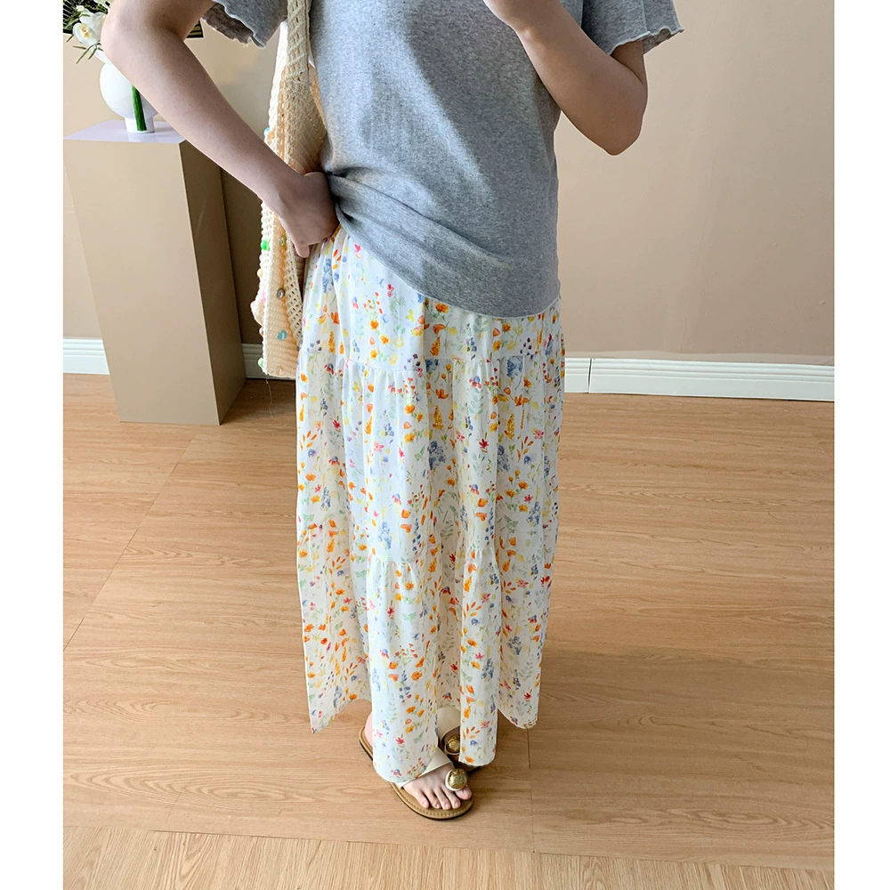 Летняя юбка А-силуэта для беременных во французском стиле с цветочным принтом, свежая и стройнящая, с уникальным дизайном и завязкой на талии.