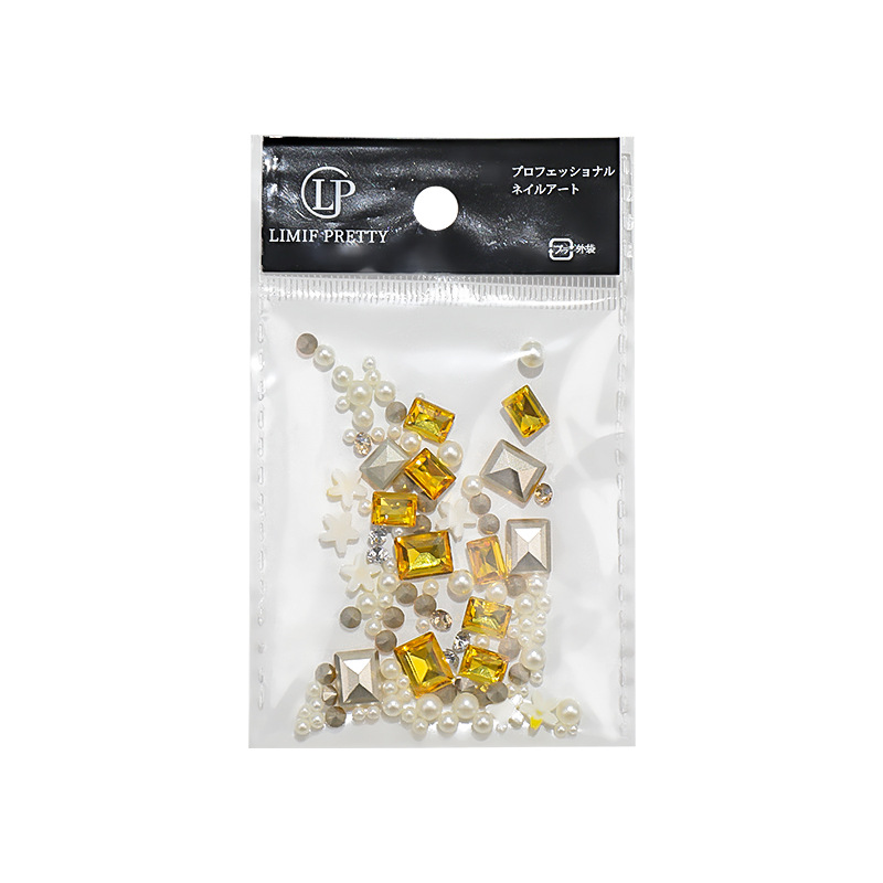 Manicura nueva primavera y verano hierba verde diamante verde margarita pequeña pila diamante perla verde puntiagudo diamante perla combinación de material de perla al por mayor