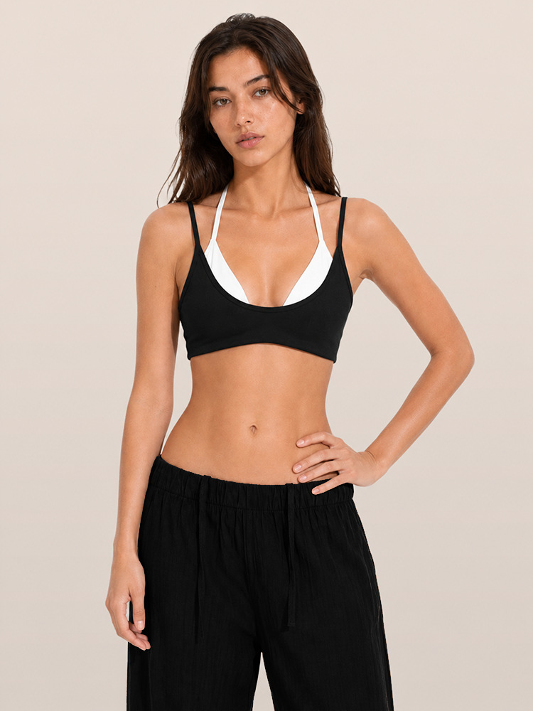 Europa y Estados Unidos de color transfronterizo falso empalme dos piezas chaleco deportivo cabina ropa de yoga hombro colgante cuello mujer con cojín de pecho