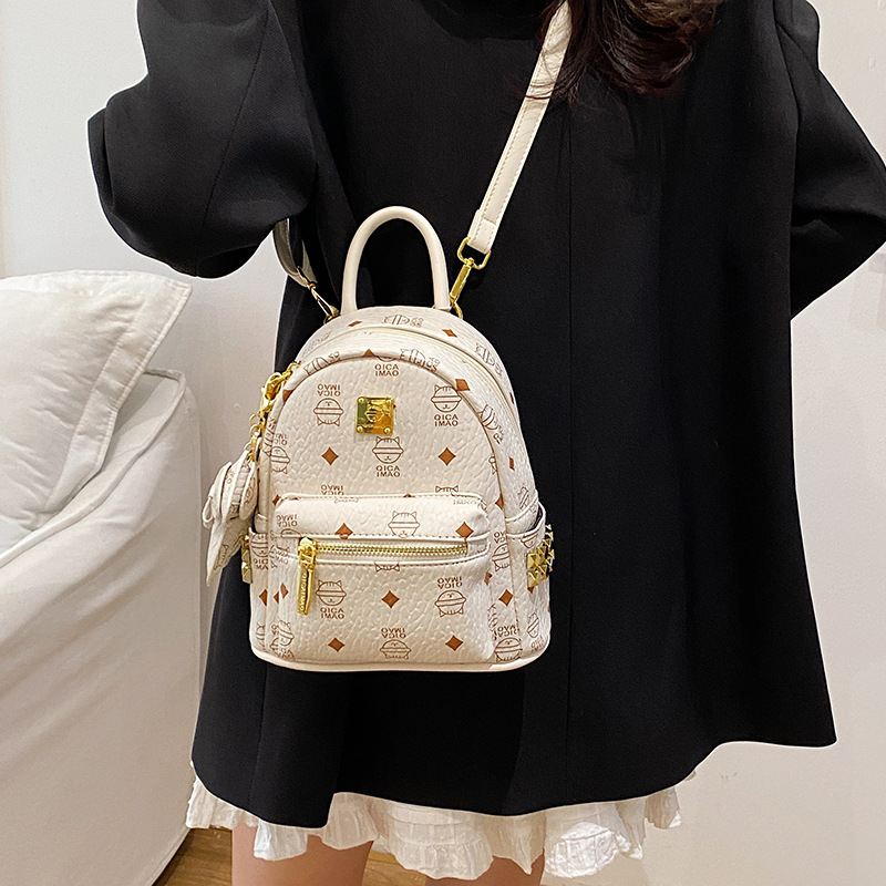 2025 nueva mochila de mujer lindo oso impresión de aire extranjero mochila de estudiantes universitarios para trabajar bolsas de mujer