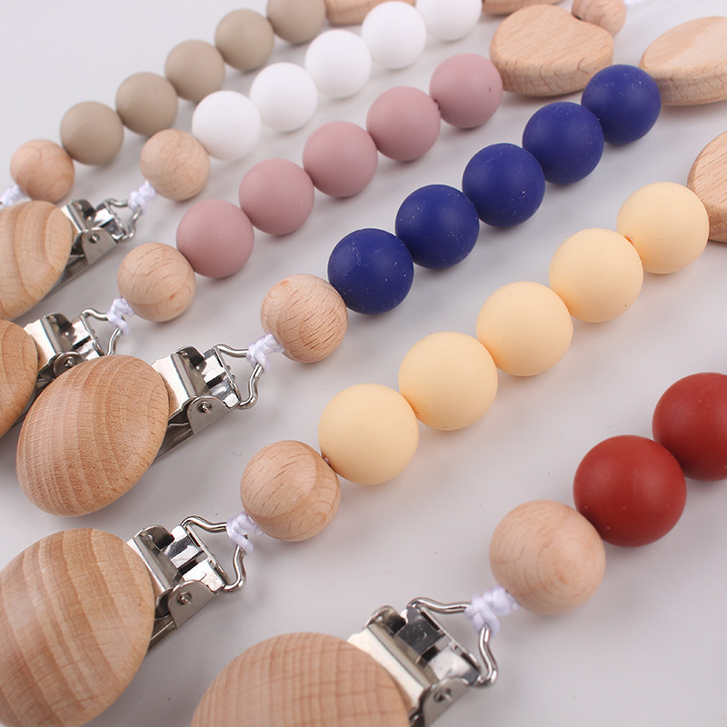 Clip de tetina de tres agujeros redondo de beech para calmar al bebé tetina de silicona de goma de diente anti-caída cadena