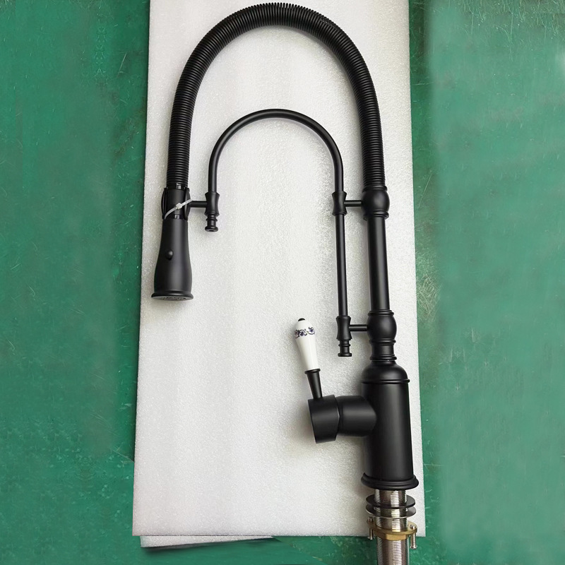 Suministro transfronterizo hogar tire primavera grifo cepillado oro caliente y fría de doble uso multi-funcional grifo de la cocina al por mayor