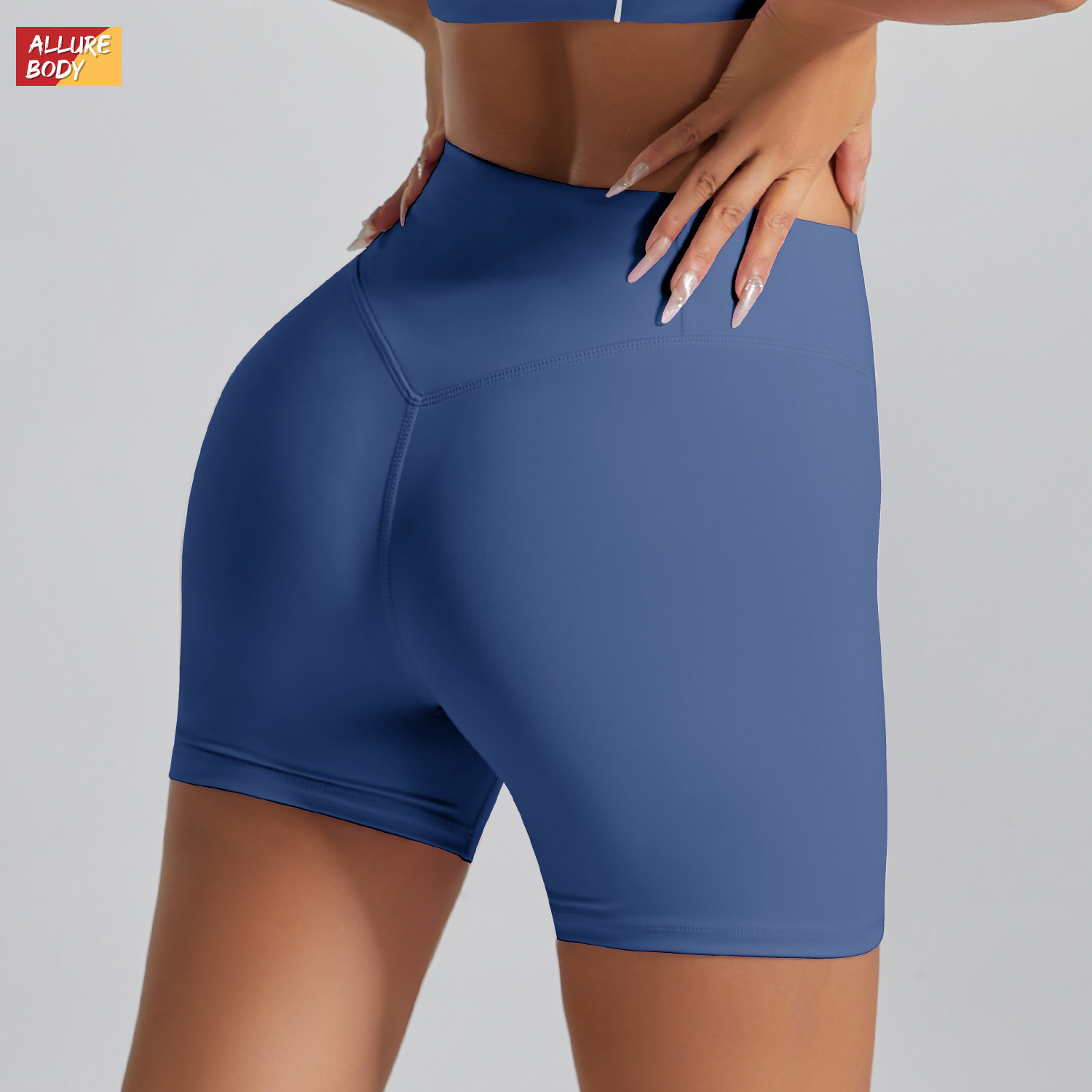 Pantalones cortos deportivos de color de contraste europeo y americano sin línea de vergüenza Cintura alta, ajustados desnudos, pantalones de yoga de fitness de cadera de melocotón, pantalones de tres puntos